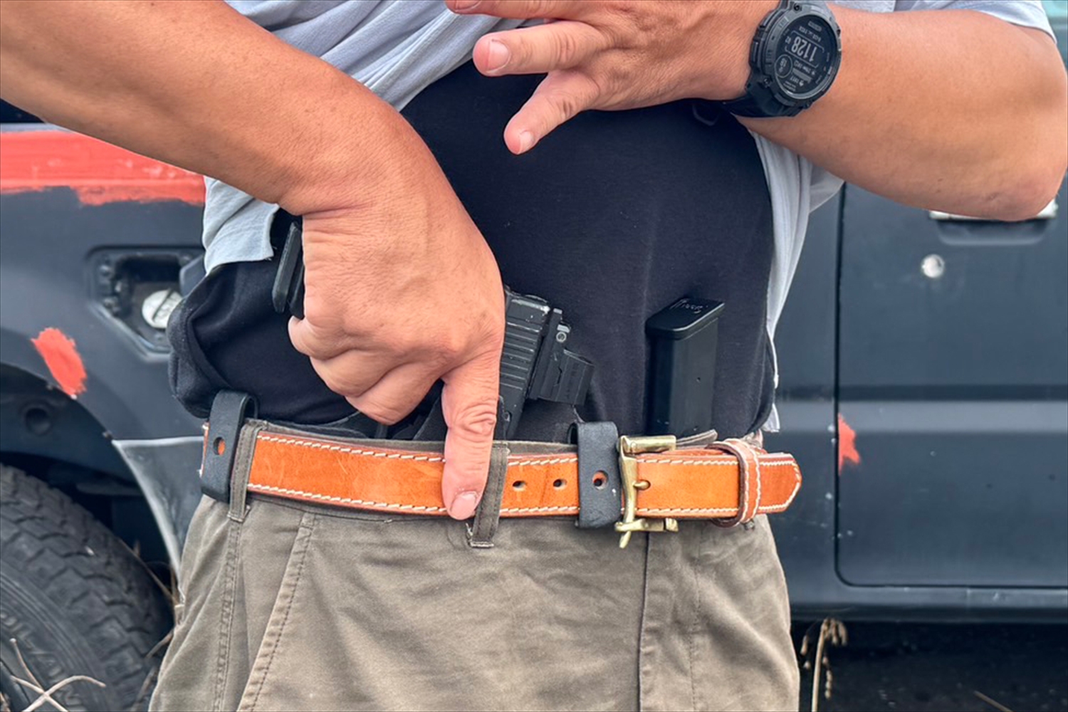 Quick draw leather belt